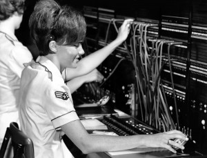 U.S. Air Force Sgt. Suzann K. Harry, of Wildwood, N.J., operates a switchboard in the underground command post at Strategic Air Command headquarters, Offutt Air Force Base, Neb., in 1967.  (U.S. Air Force photo)